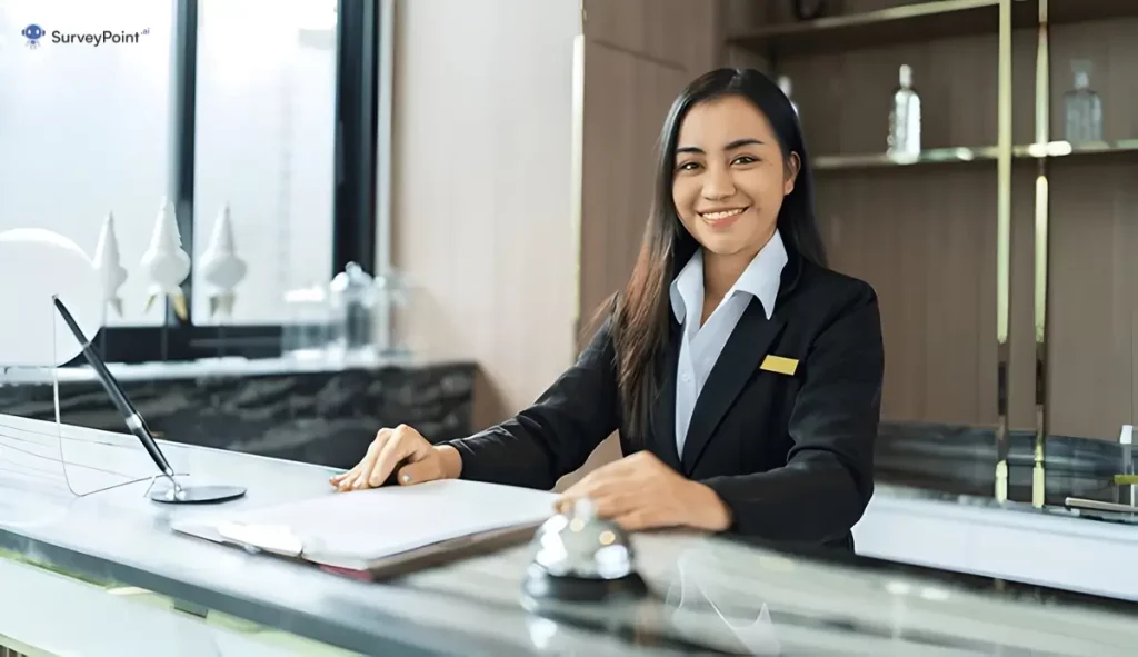 A woman in a suit sitting at the front desk, filling out a Prework Survey.