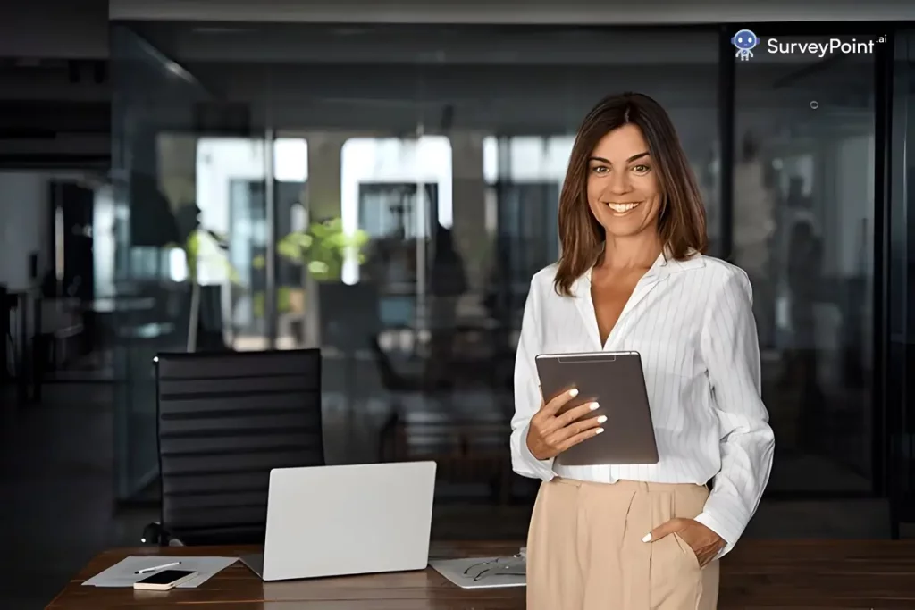 Change Management Survey:  A woman in a business shirt standing in front of a desk.