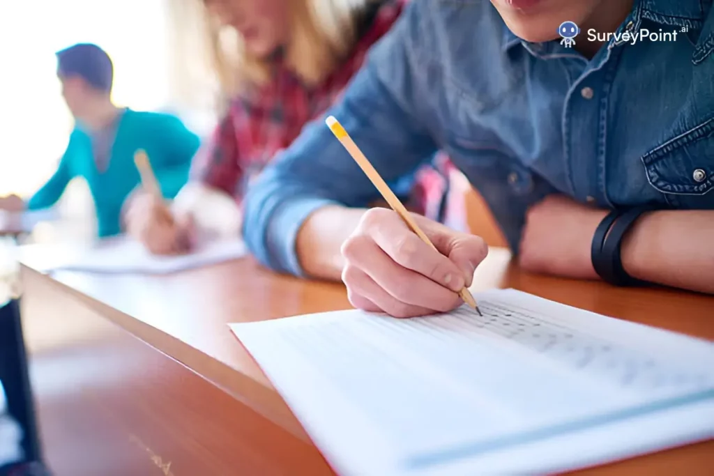 A man diligently fills out a paper survey titled 'First Day Student Survey' with a pen in hand.