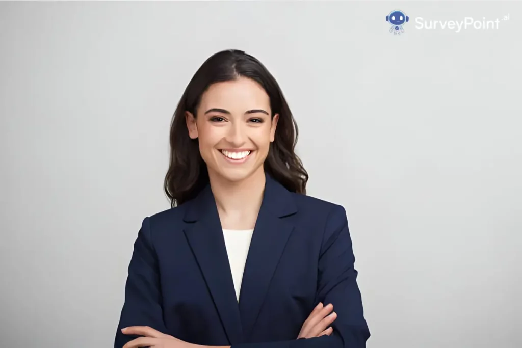 A woman in a business suit smiles confidently, representing professionalism in a survey for high school students.